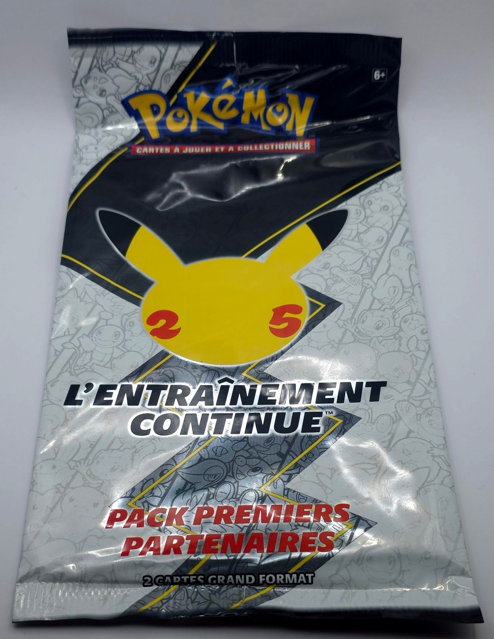 Booster Pokémon 25e Anniversaire – Carte Jumbo Starter (FR, illustration aléatoire)
